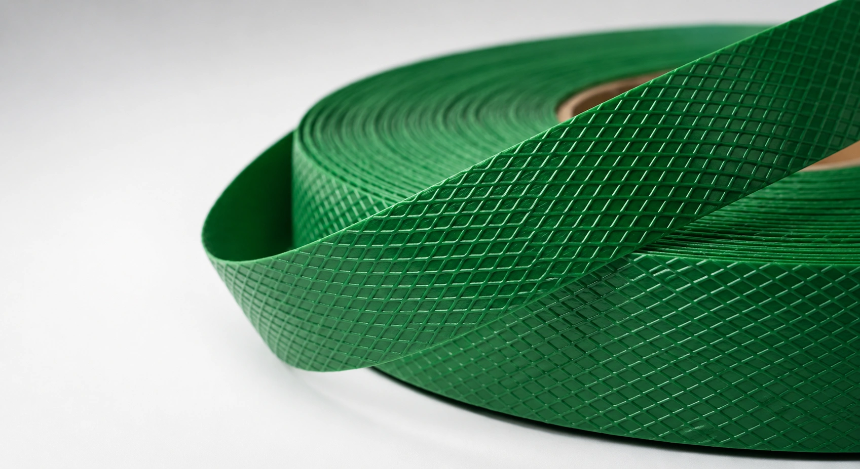 Machine-grade embossed PET strapping coil for automatic strapping tools — Greenstrix